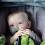 Baby in car seat with mirror